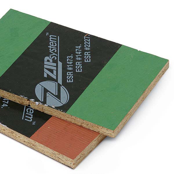 Two pieces of ZIP System sheathing and tape, perfect for exterior renovations, are displayed in a staggered stack. The top piece has a green surface labeled "ZIP System" with ESR#1474 and ESR#2217, while the bottom piece features a brown surface with the same branding and numbers partially visible. Ideal for projects in Madison, WI.